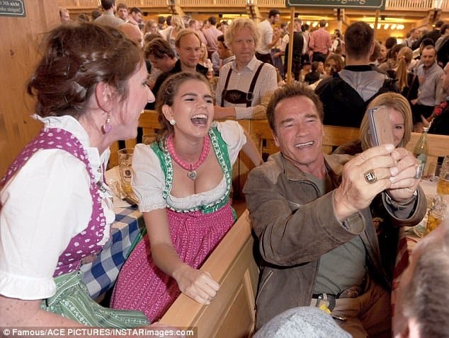 Arnold Schwarzenegger takes a few beers at Oktoberfest in Munich