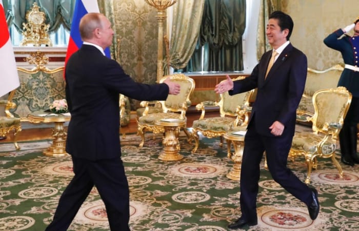 Vladimir Putin, Shinzo Abe enjoy a night at the Bolshoi Theatre in Moscow after talks on Kuril Islands
