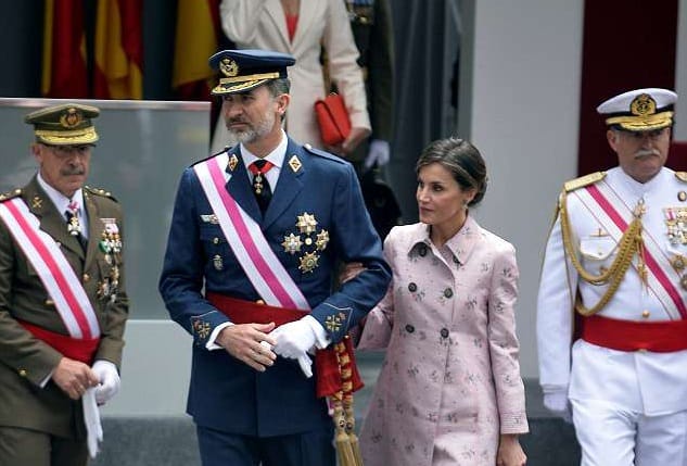 Queen Letizia of Spain looks stylish in a pink coat as she attends Armed Forces Day parade in Logrono