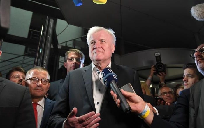 Germany migrants crisis: Merkel ally Seehofer offers to quit