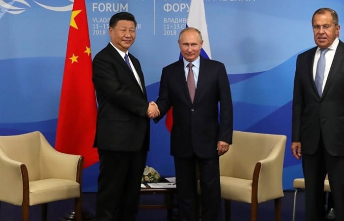 Vladimir Putin, Xi Jinping vow to fight protectionism