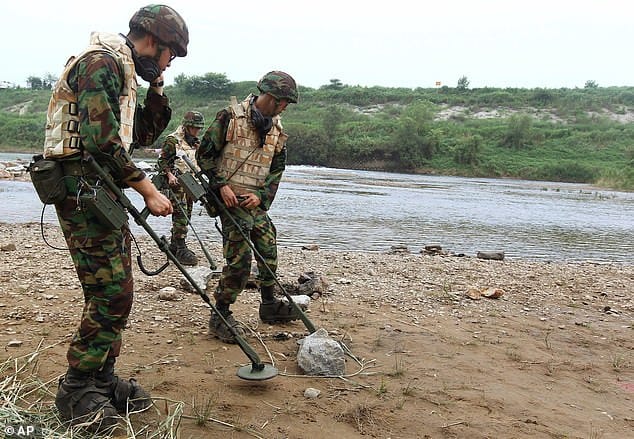 North, South Korea begin removing landmines along their heavily fortified border