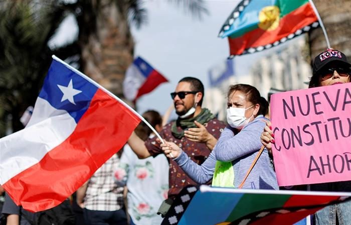 Chile plans to rewrite constitution amid mass protests