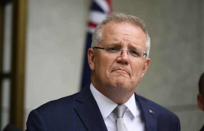 Australian PM welcomes vaccine deal as virus surge abates