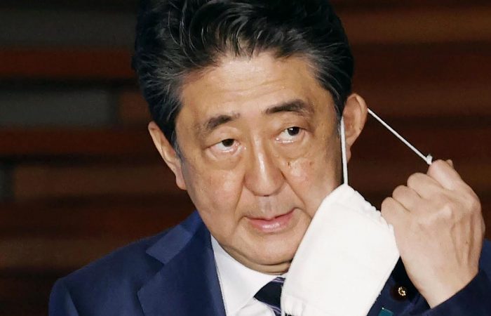 Ex-PM Abe apologizes over a funding scandal