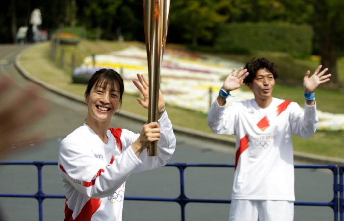 Olympic torch runs through empty park in Osaka as COVID cases rise