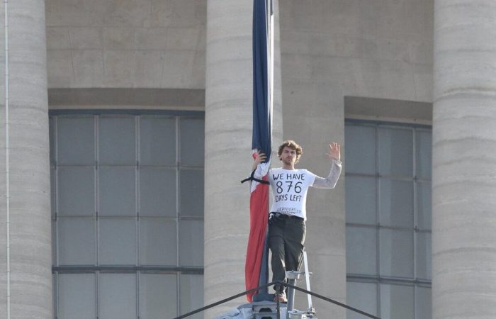 In Paris, an eco-activist tied himself to a French flag on the roof of the Pantheon.