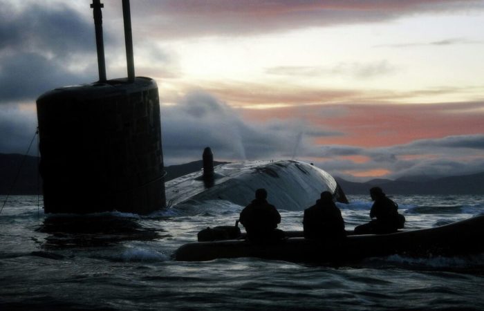 A British submarine aborted a secret mission due to a fire on board.