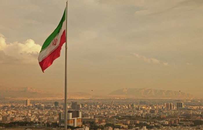 Iran executes two people accused of killing a member of the Basij forces.