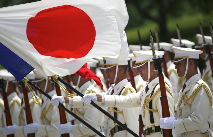 Japan passed a law on financing the growth of military spending.