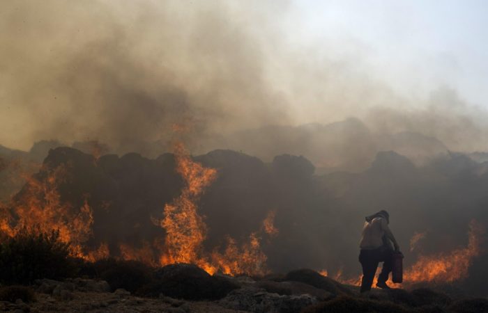 18 people have died in a wildfire in Greece.