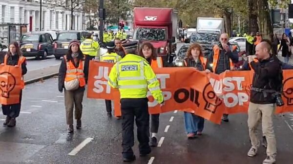 In London, 35 environmental activists were detained for protesting on the road.